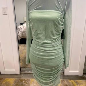 Beautiful sage color dress. One in size medium and on in large.
